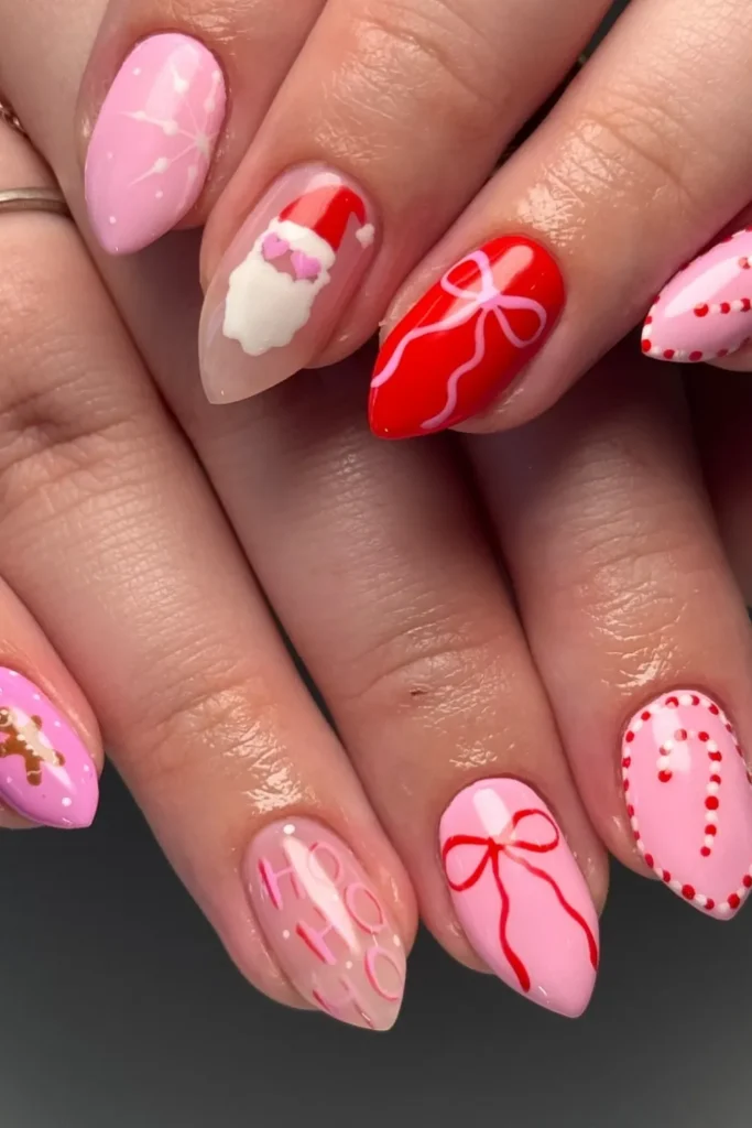 Pink Christmas Nails With Santa, Bows, and Candy Canes
