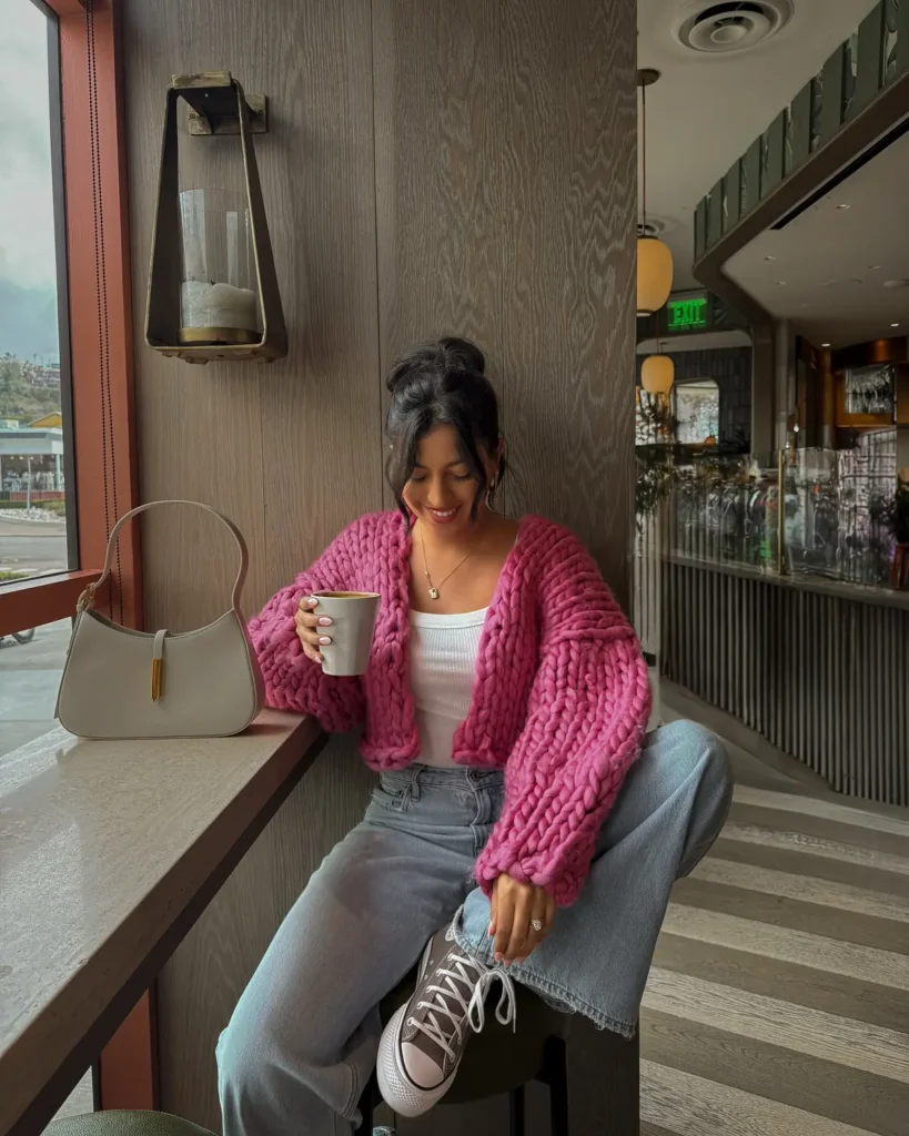 A Hot Pink Chunky Cardigan With a Structured Bag