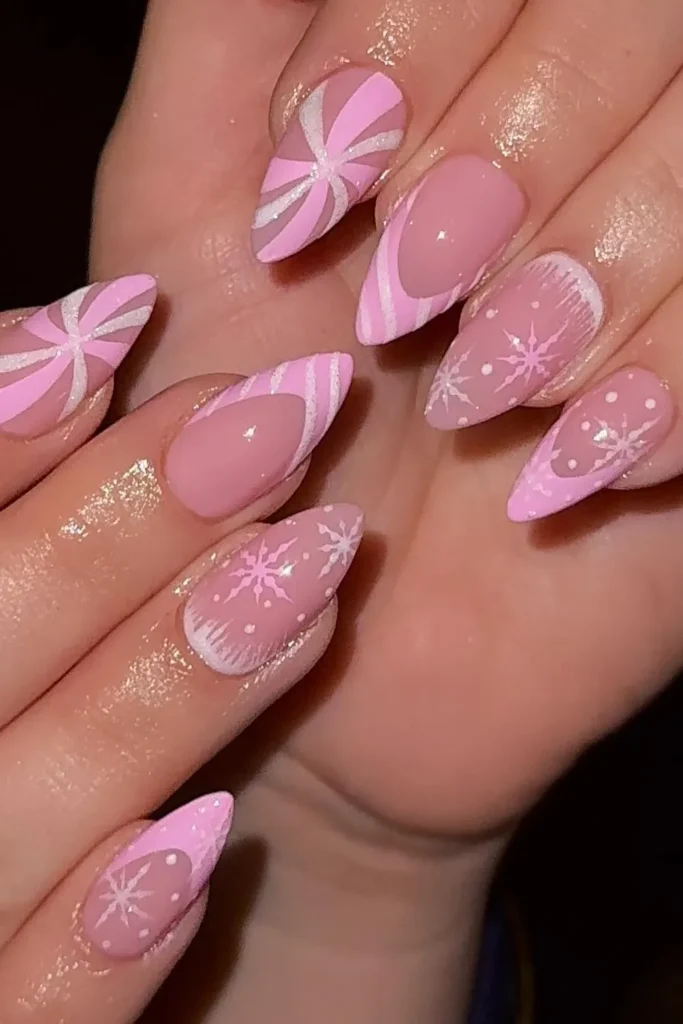 Pink Peppermint Swirls and Snowflakes on Stiletto Nails