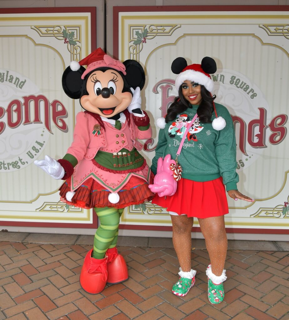 Green Christmas Sweatshirt With a Red Pleated Skirt
