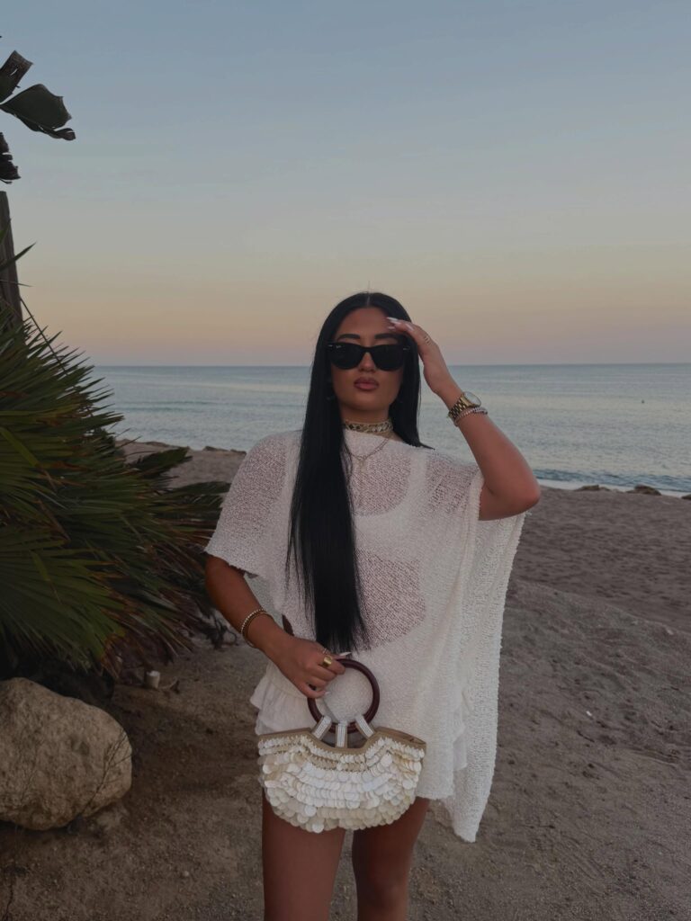 Sheer White Knit Top With a Shell Bag