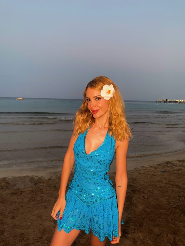 Turquoise Sequin Mini Dress With a Tropical Flower